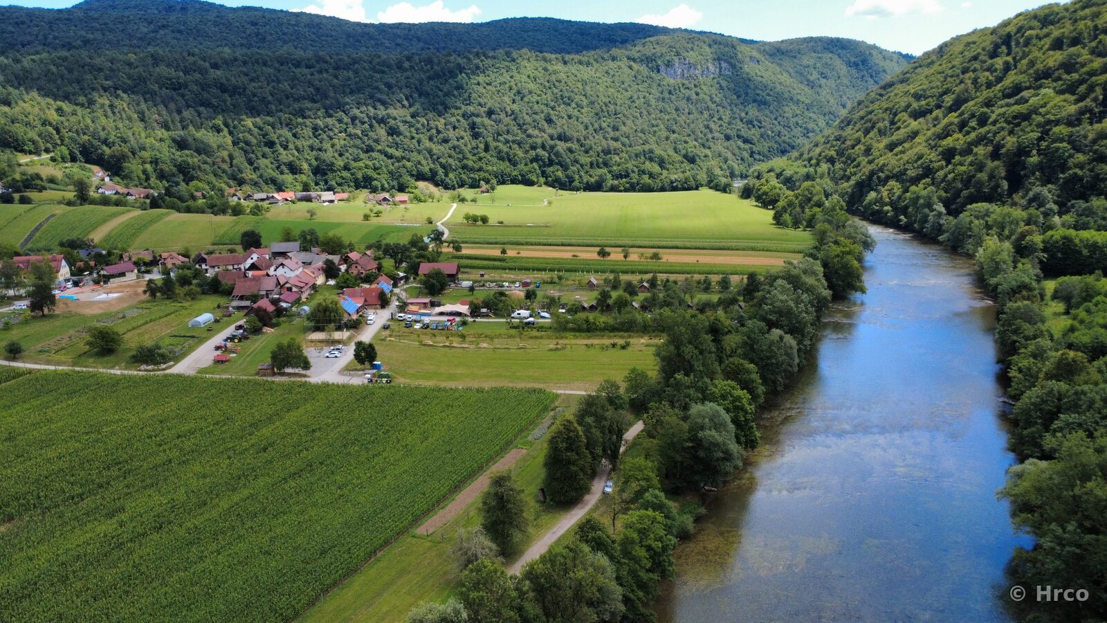 Village by river valley