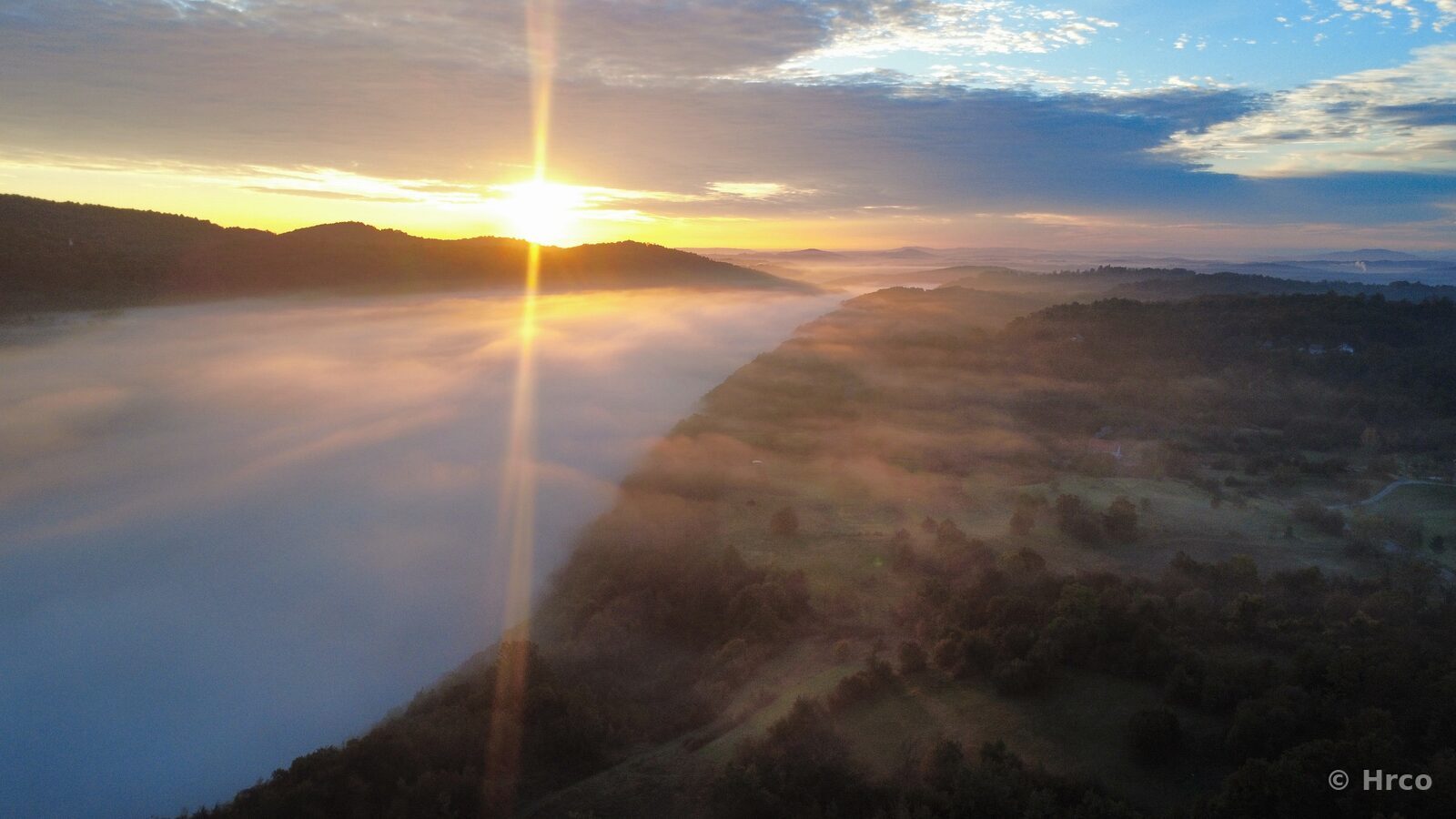 Dramatic sunrise with sunbeam
